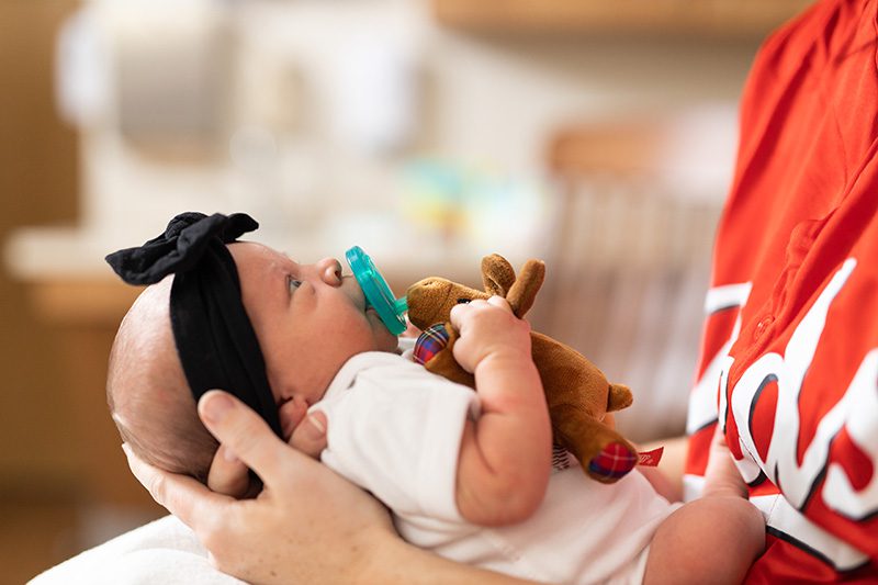 Couple getting ready for labor at hospital with Nurse