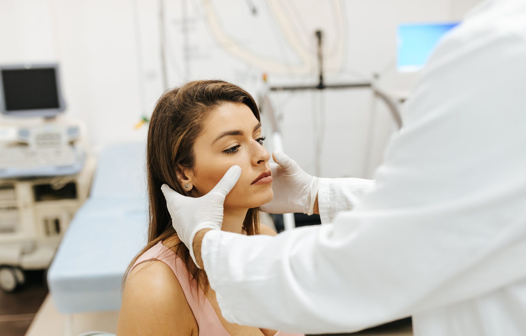 Doctor Examines Patient’s Sinuses Doctor Examines Patient's Sinuses