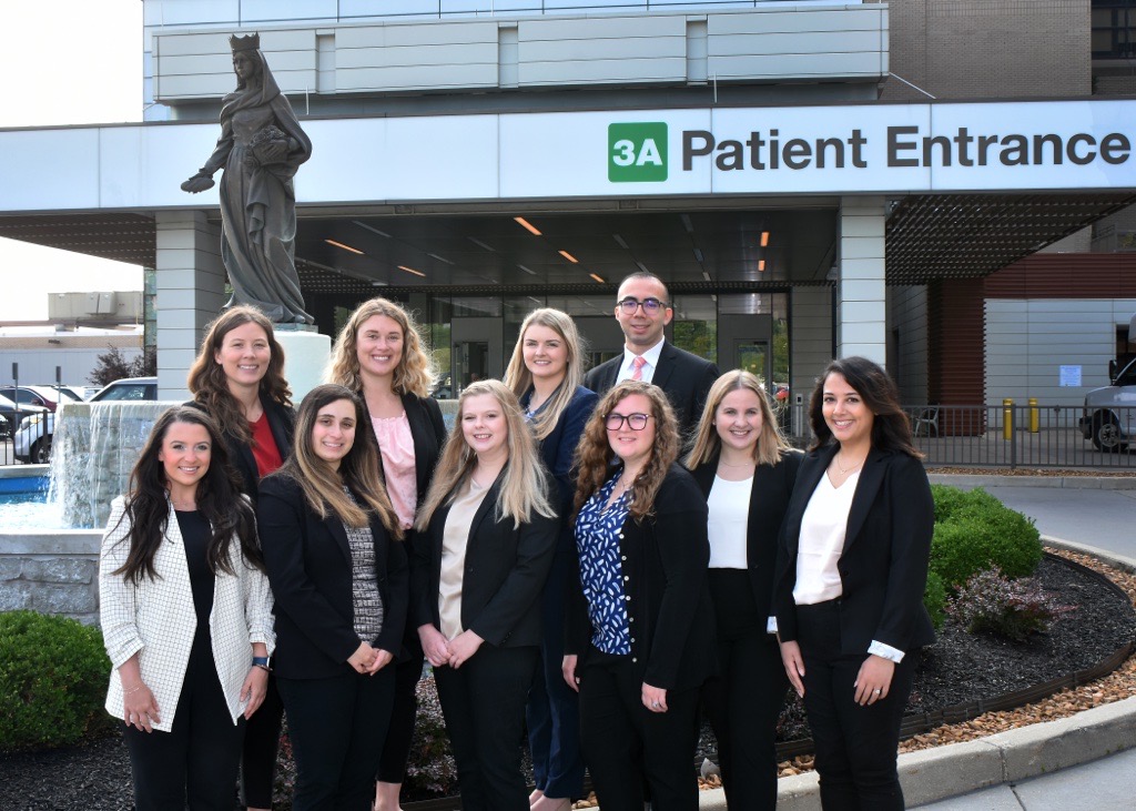 Group Shot 3 Pharmacy Residents stand outside St. Elizabeth Edgewood