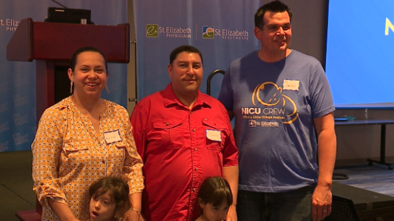 A Family poses for a photo at the St. Elizabeth NICU reunion. By WCPO News