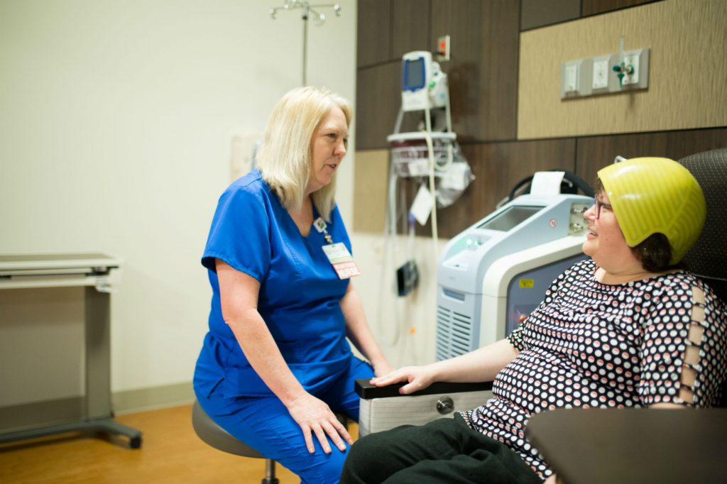 Chemotherapy patient wearing DigniCap