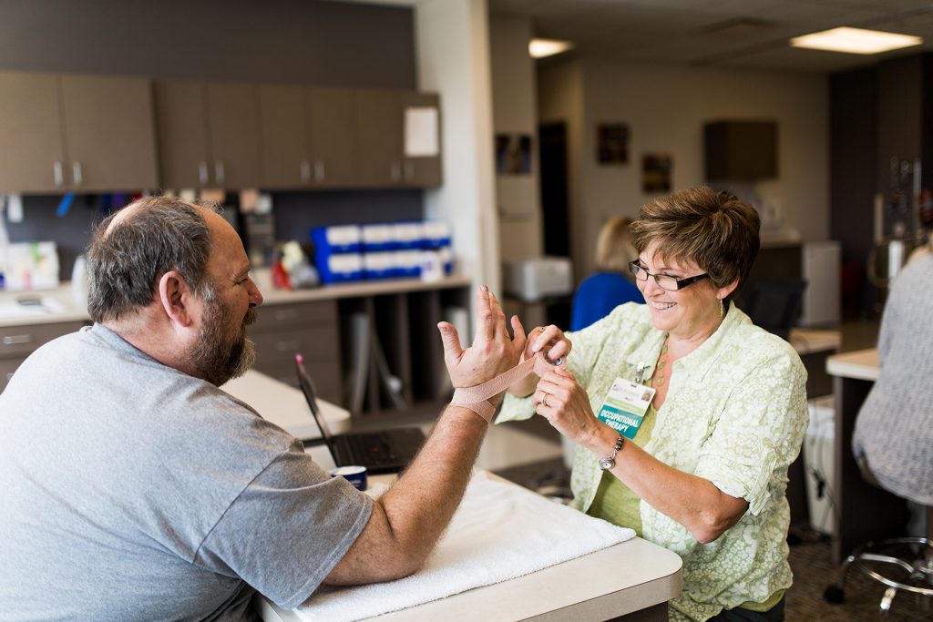 Musician getting hand therapy