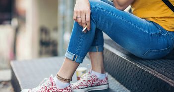 Need a Reason to Quit Smoking? Here are Five. Girl smoking on outdoor steps.