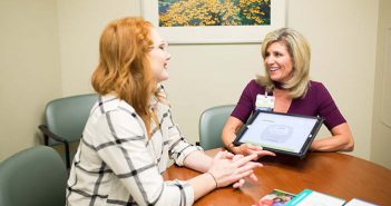 Genetic counselor discussing results with patient.