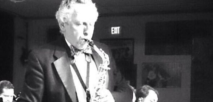 Ken Foltz playing sax, black and white photo