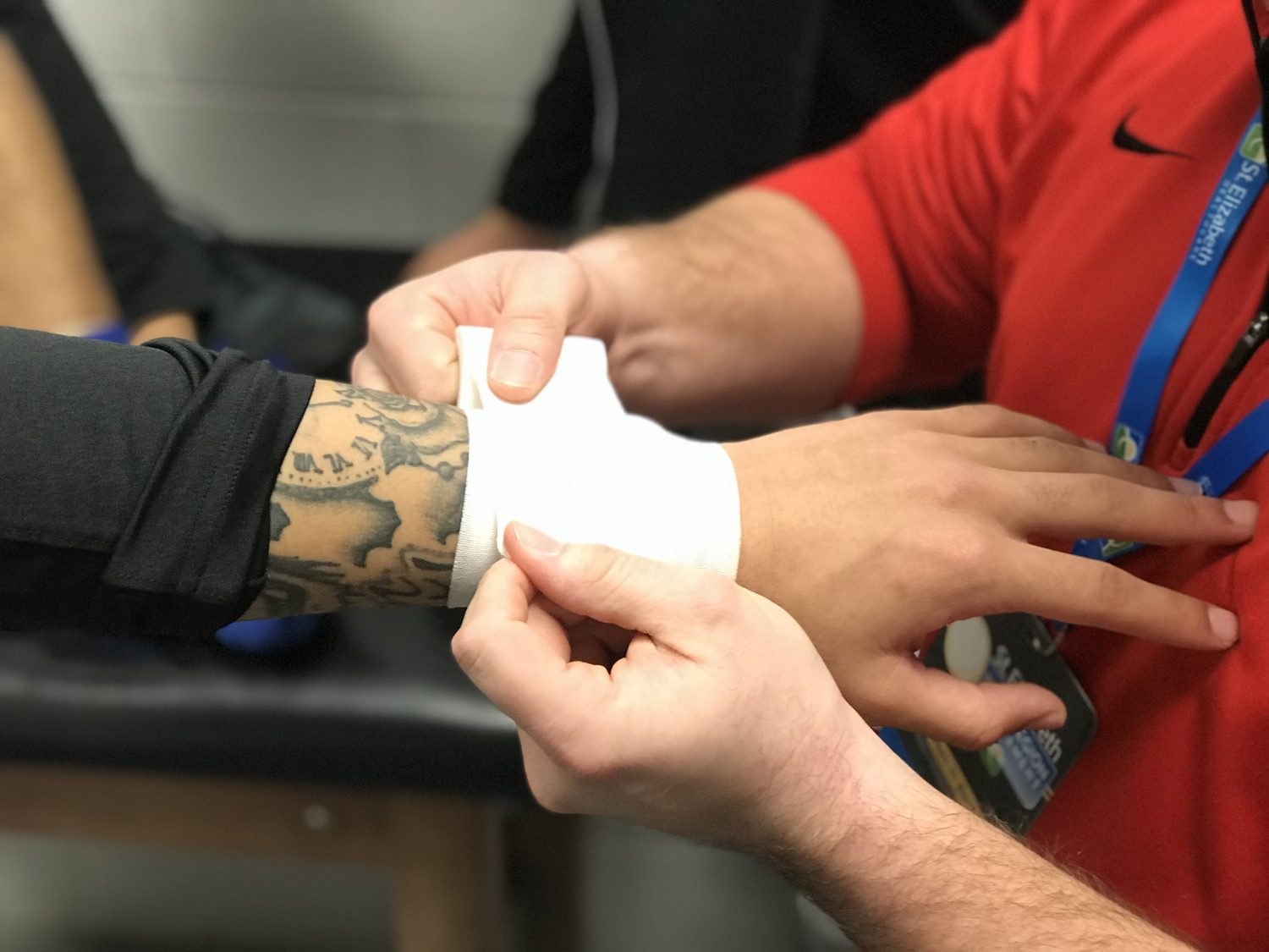 Ninth Region Basketball Tournament A therapist wraps a wrist.