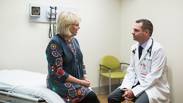 Dr. Flora meets with Cancer Care Patient 