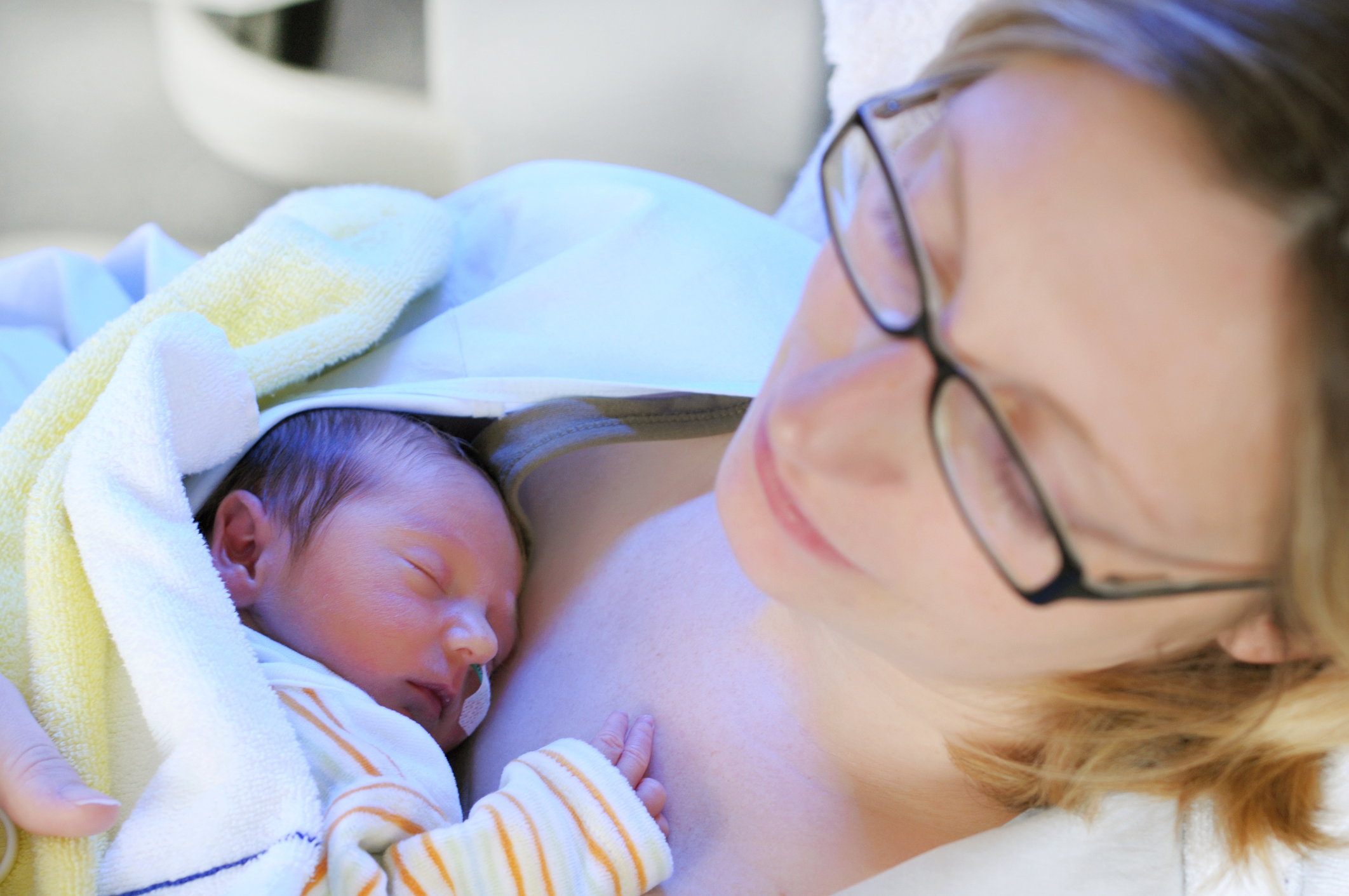 Mother and her newborn baby in hospital